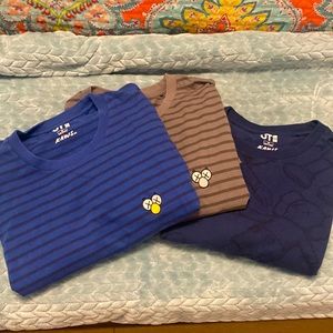 Three Uniqlo Kaws tees Sesame Street
